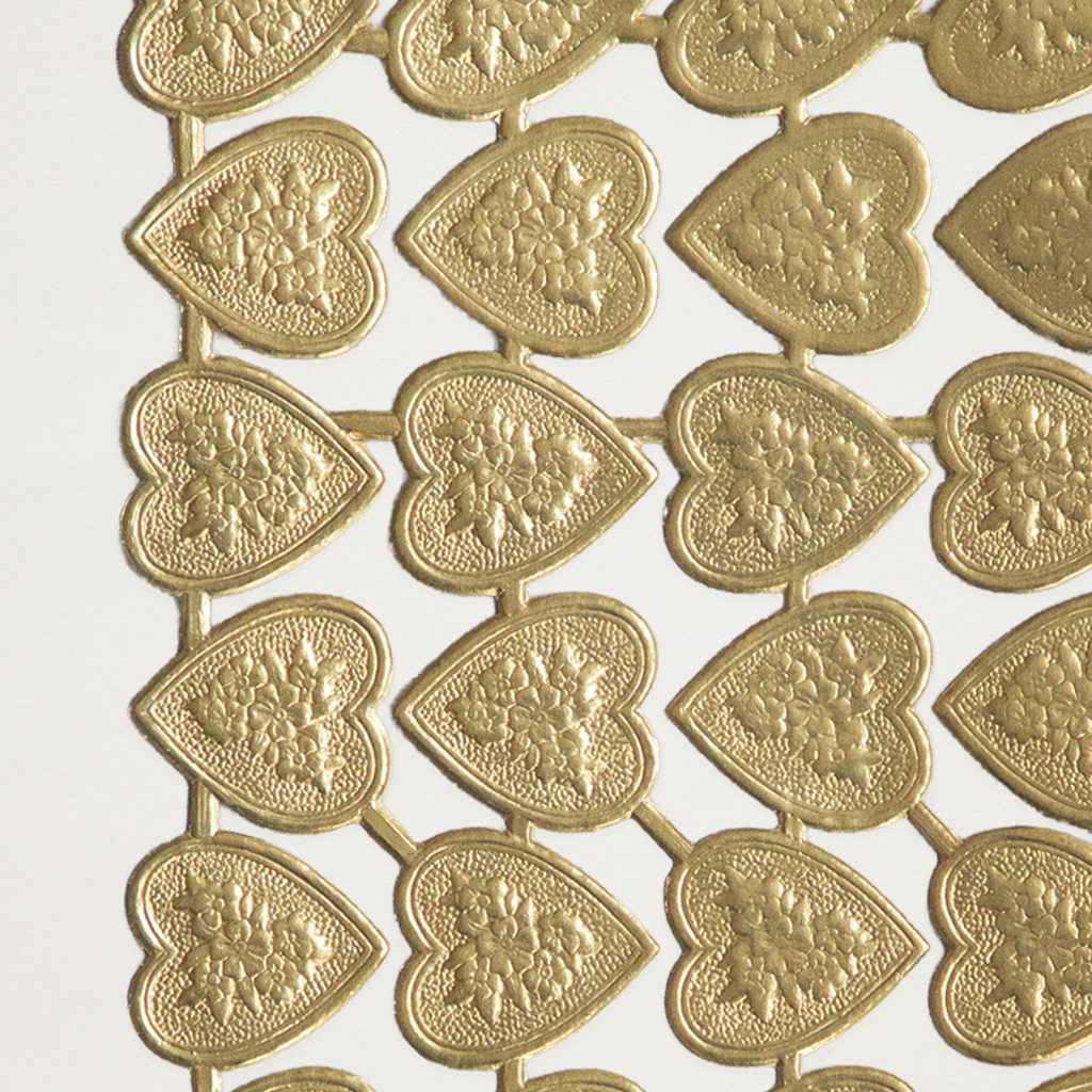 Recortes corações dourados