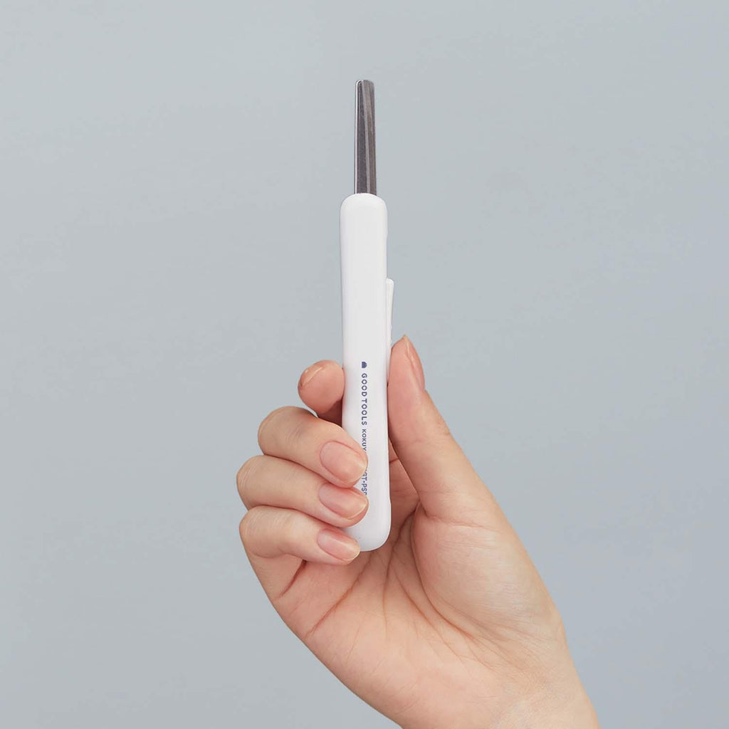 Japanese white retractable scissors