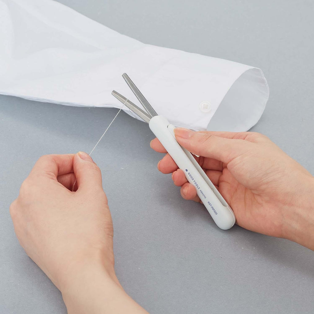 Japanese white retractable scissors