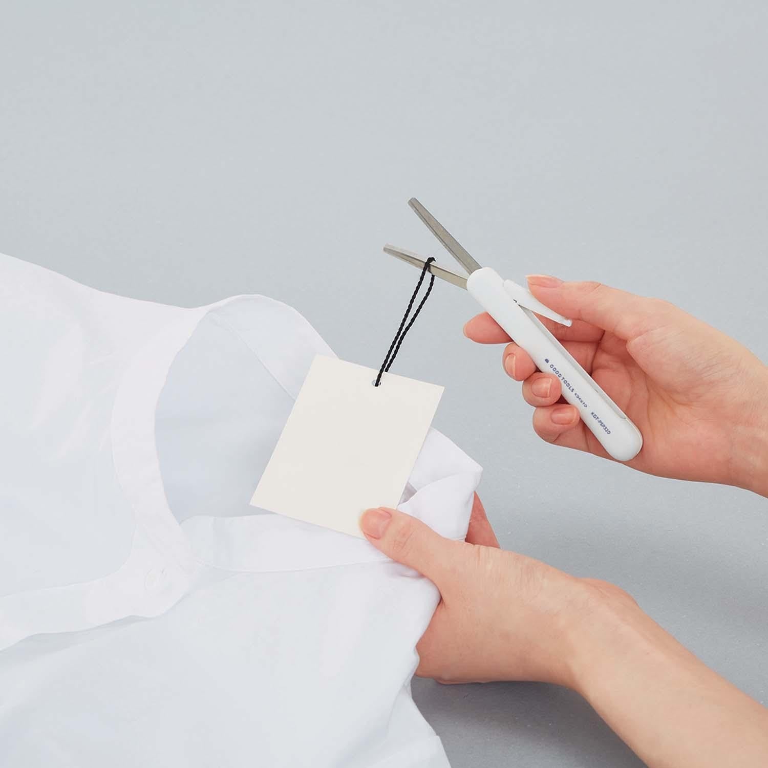 Japanese white retractable scissors